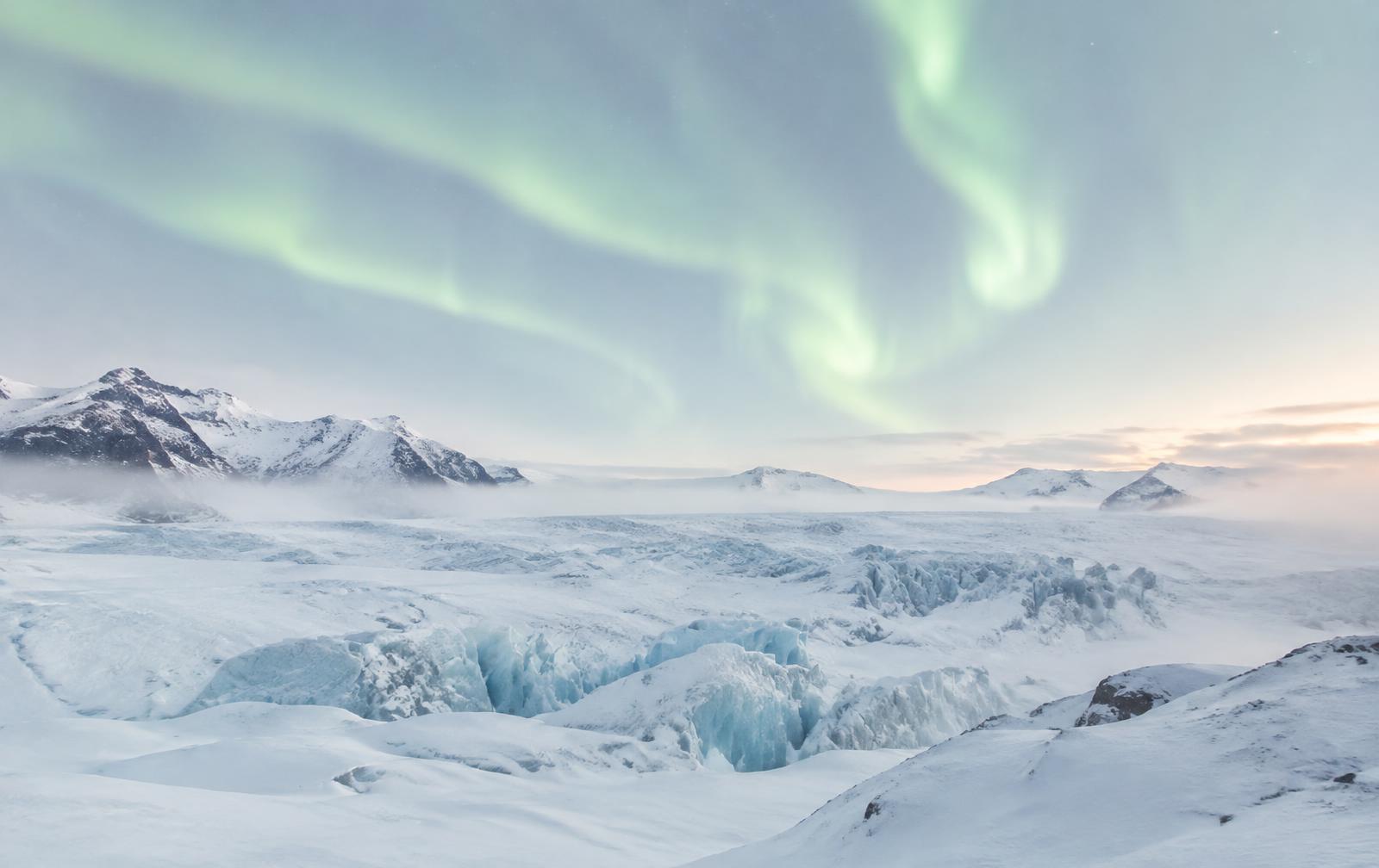 Glacier under stars and a green aurora ribbon, Aurora Wallet release notes